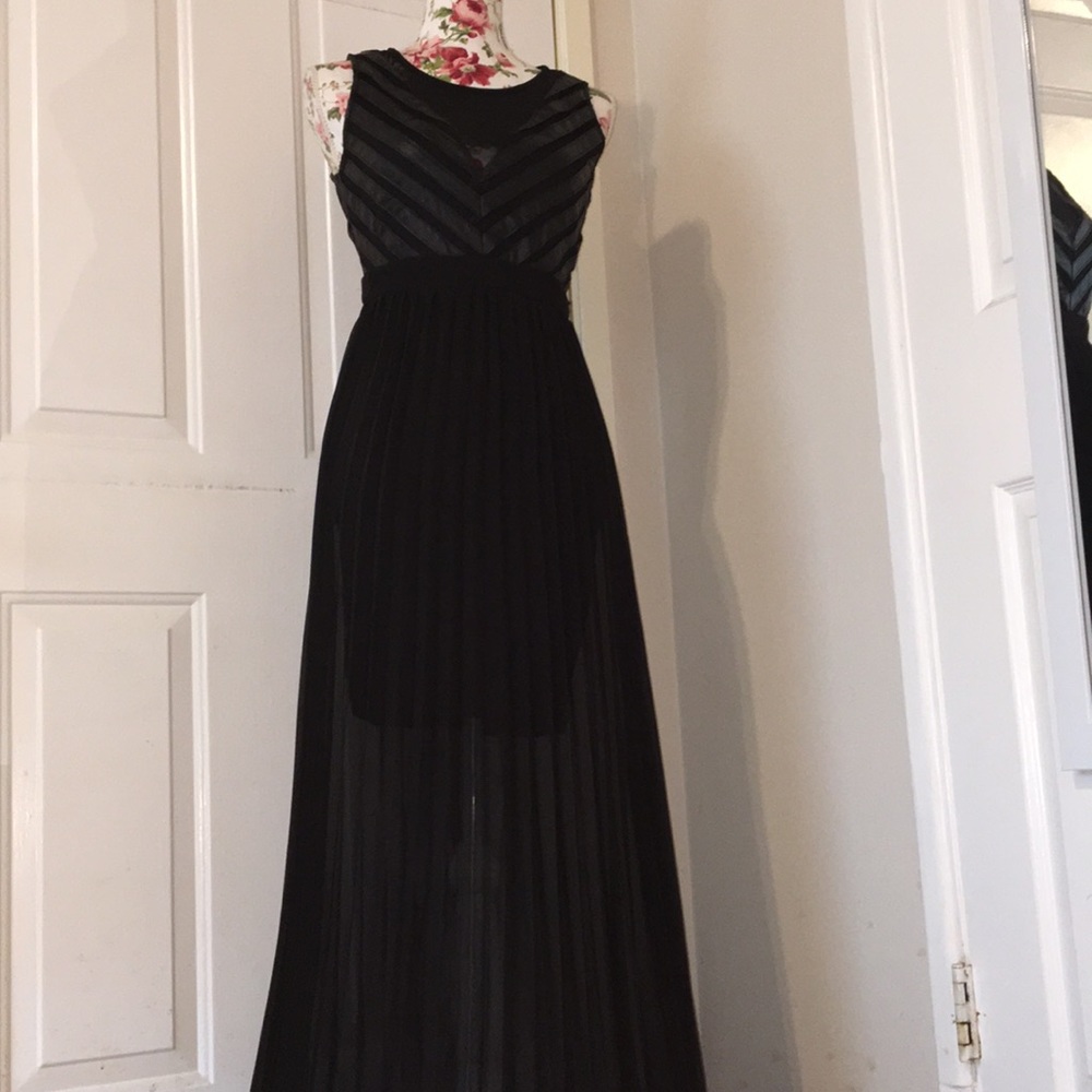 Long black Dress with Faux leather lining.
